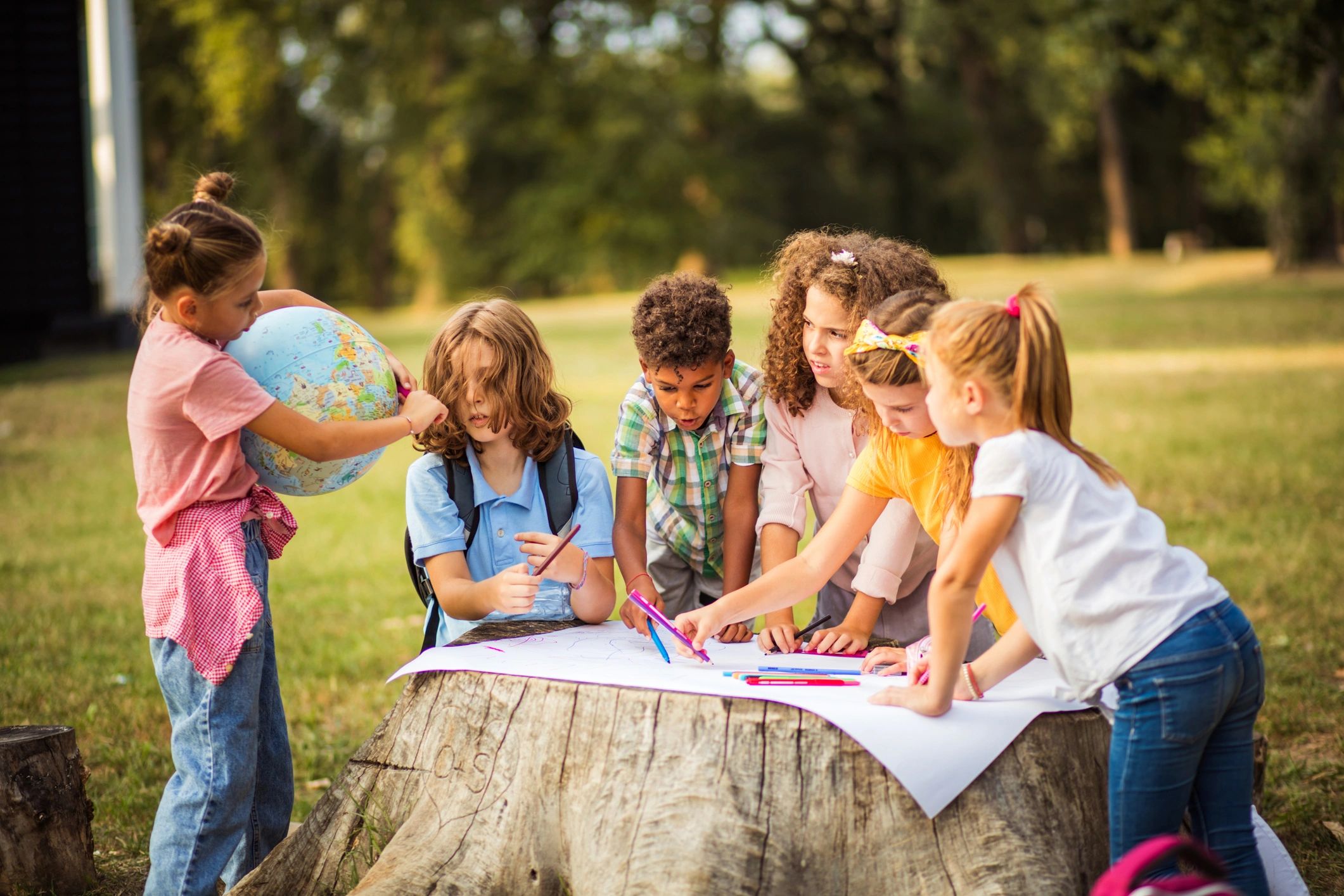 children learning outdoors hands-on education